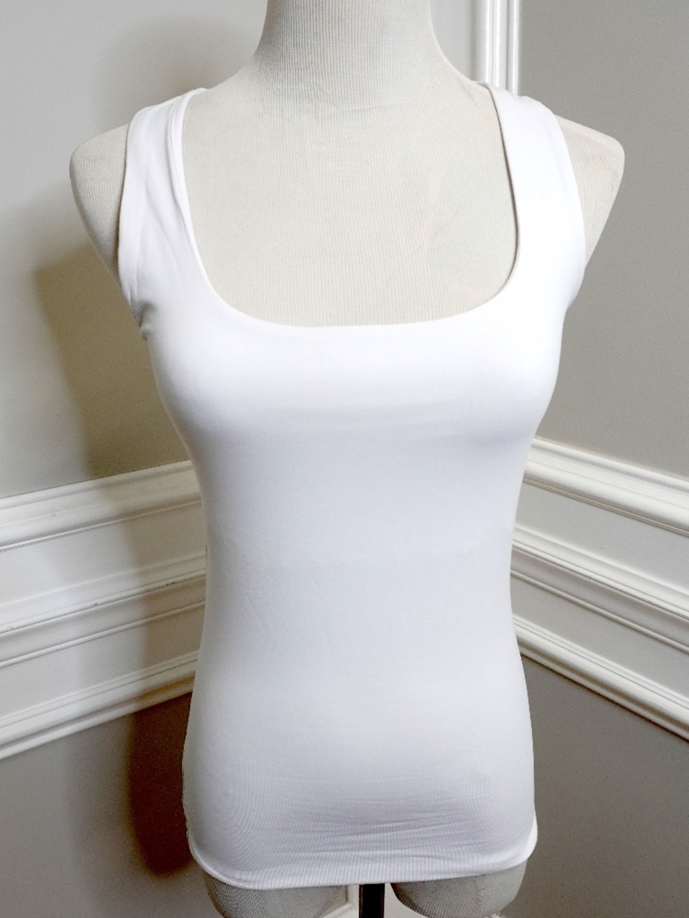Zara tank top features a flattering scoop neckline